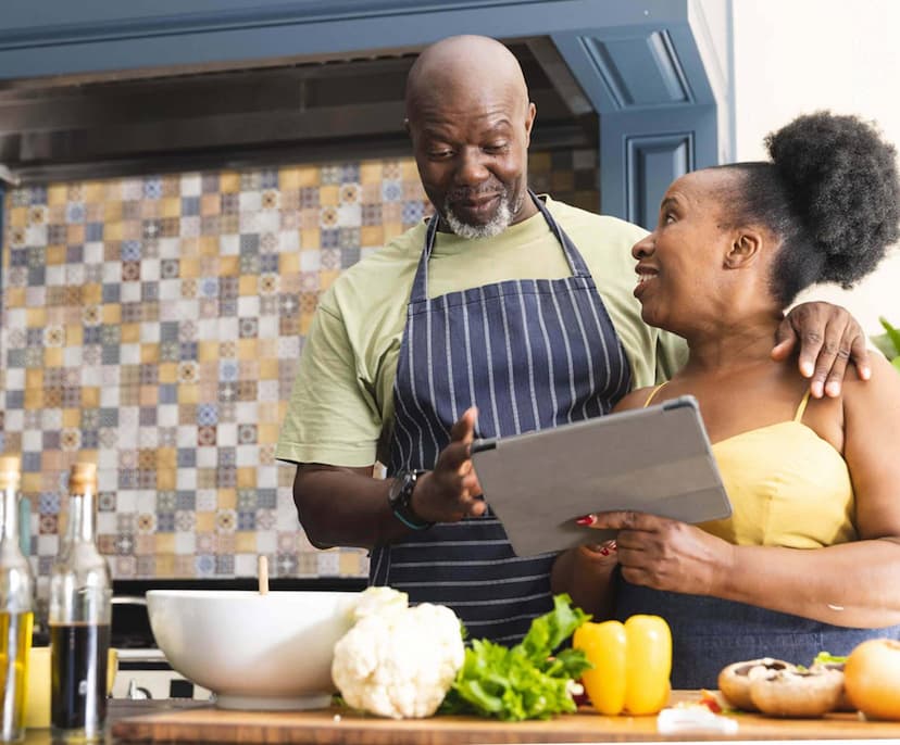 couple in kitchen making healthy meal